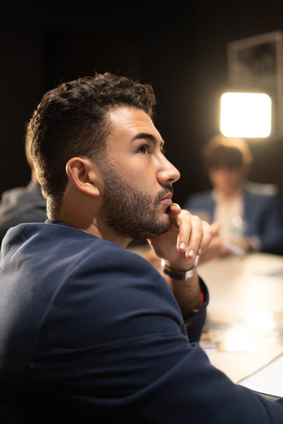 Carlos Doce listening during a client session